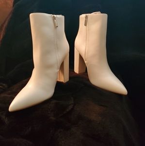 white booties. never worn. Block heel